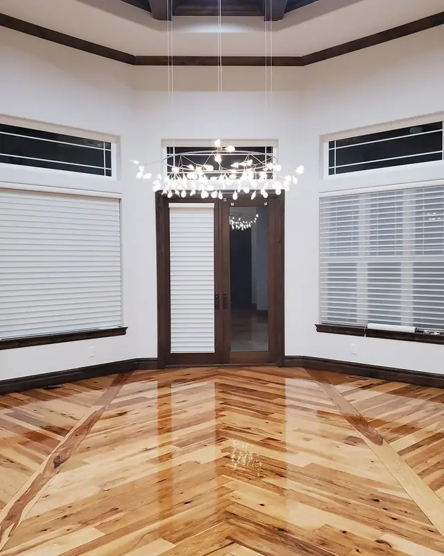 Hardwood floor with a custom inlay border, repaired and refinished
